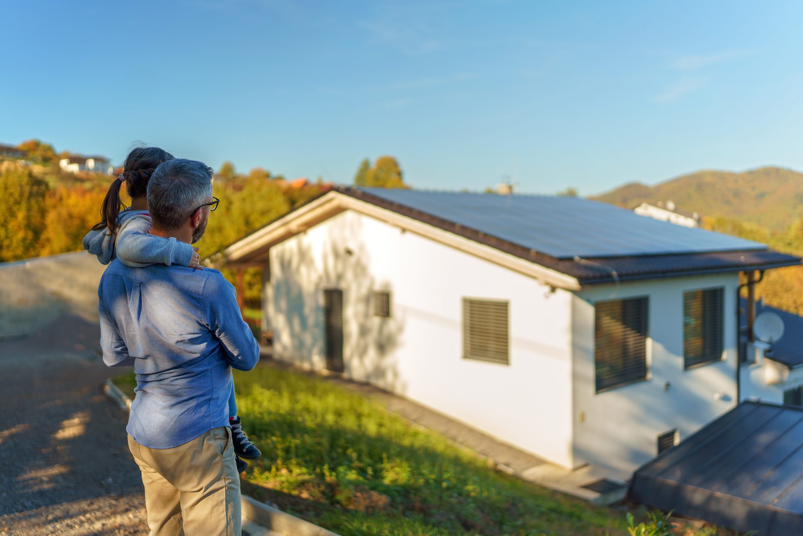 Sustainable energy solutions for holiday cottages: solar panels and EV charging.